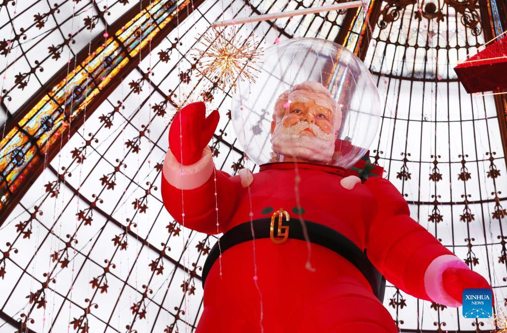 Giant Christmas tree seen at Galeries Lafayette department store