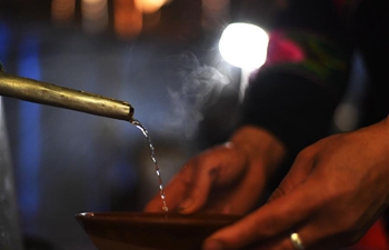 Miao villagers make rice wine for upcoming Spring Festival