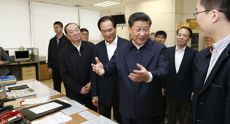 习近平到新华社调研